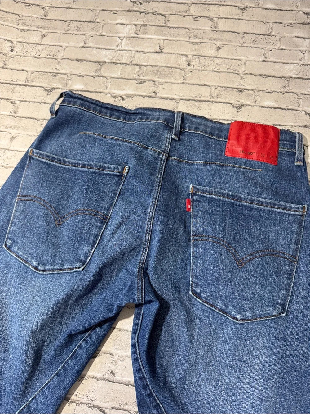 Levi’s mens 31x32 LEJ 502 tapered premium engineered denim blue jeans EUC